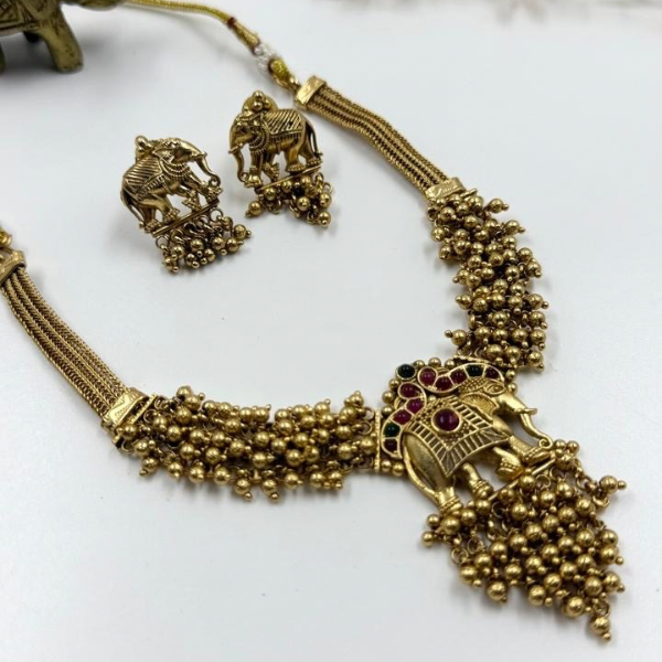 Gold-Toned Elephant Parade Choker Necklace and Earrings Set Raja