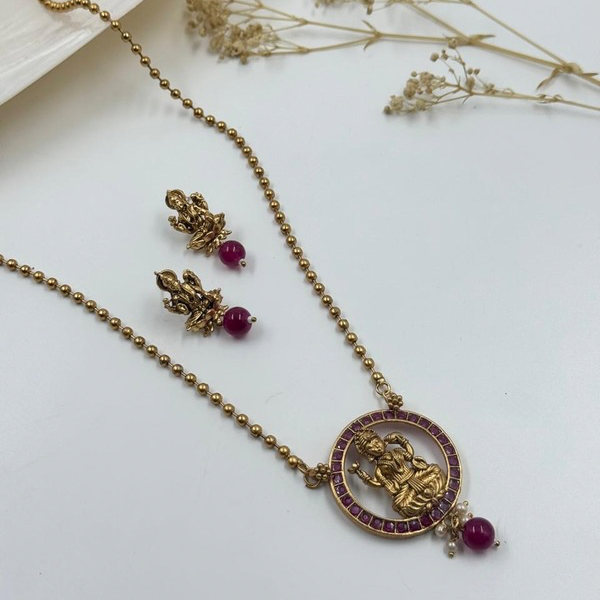 Lakshmi’s Grace: Antique Gold Necklace Set with Maroon Accents