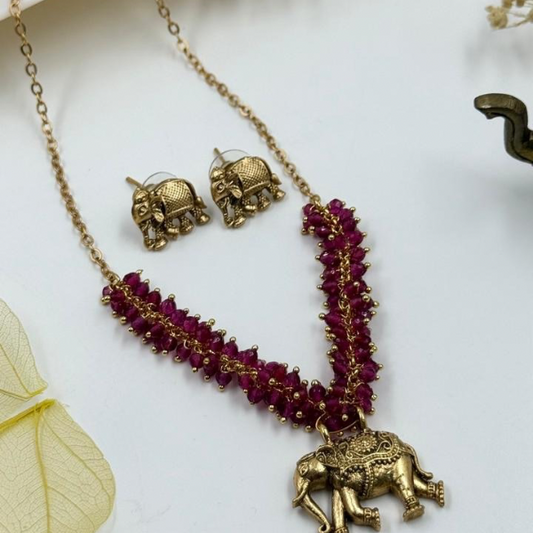 Elephant Elegance: Vibrant Red Necklace and Earrings Set