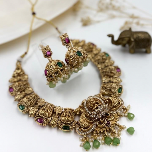 Regal Bloom Temple Set – Antique Gold Necklace with Jhumkas & Dual Tone Stones