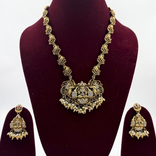 Grand Goddess Temple Necklace Set with AD Stones & Antique Gold Finish
