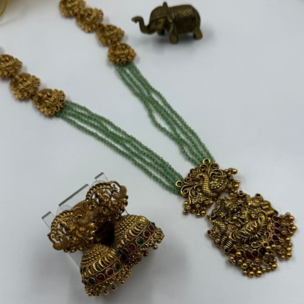 Kanchana Gold Temple Set – Adorned with Emerald Hues & Jhumkas