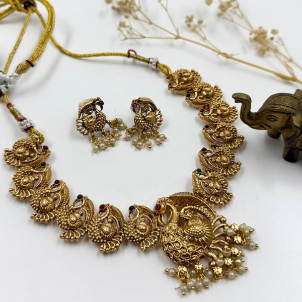 Peacock Majesty: Gold-Colored Necklace and Earrings Set