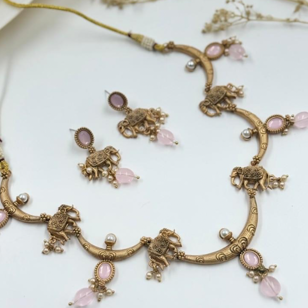 Elegant Antique Gold Elephant Motif Necklace Set with Pink Stones
