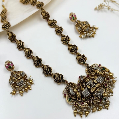 Grand Goddess Temple Necklace Set with AD Stones & Antique Gold Finish