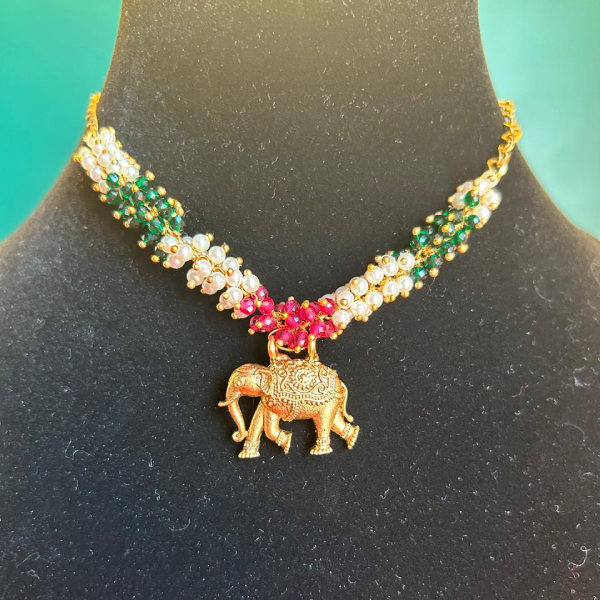 Vibrant Elegance: Layered Green and Pink Elephant Necklace and Earrings Set